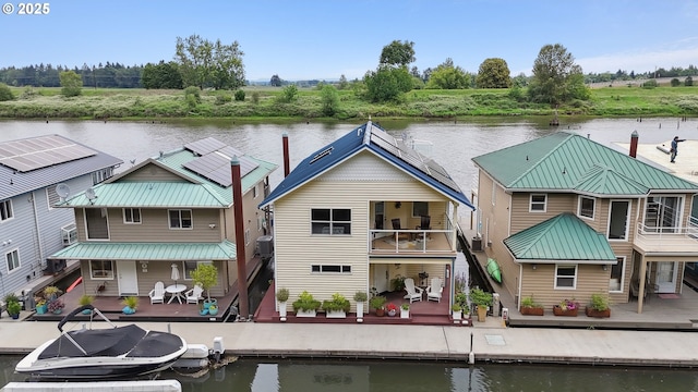 14587 NW Larson Rd Unit 4, Portland, OR 97231 - view of building exterior featuring a water view