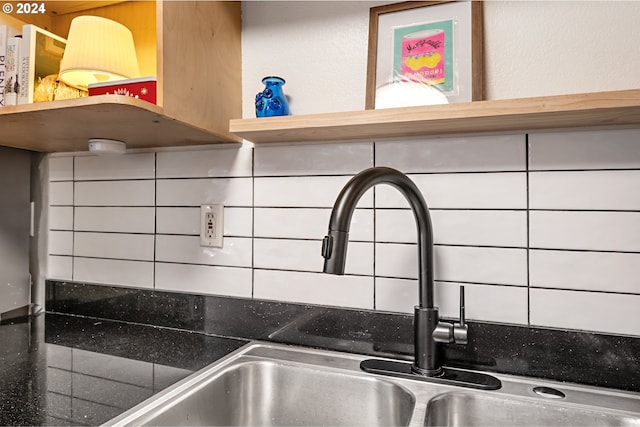 room details with backsplash and sink