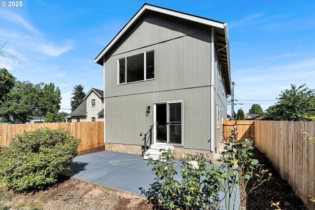 210 Mill St, Dayton, OR 97114 - rear view of property with a patio area, entry steps, and a fenced backyard