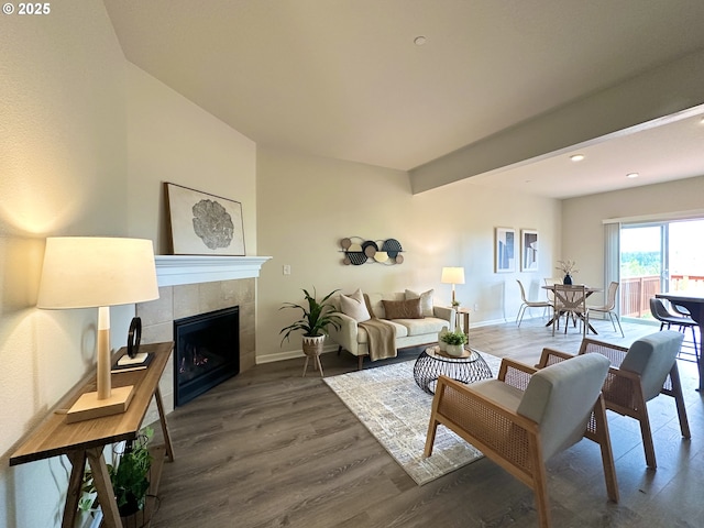 12972 SE 156th Ave, Happy Valley, OR 97086 - living area with baseboards, wood finished floors, a tiled fireplace, and recessed lighting