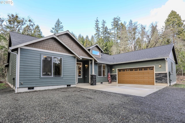 craftsman-style home featuring a garage