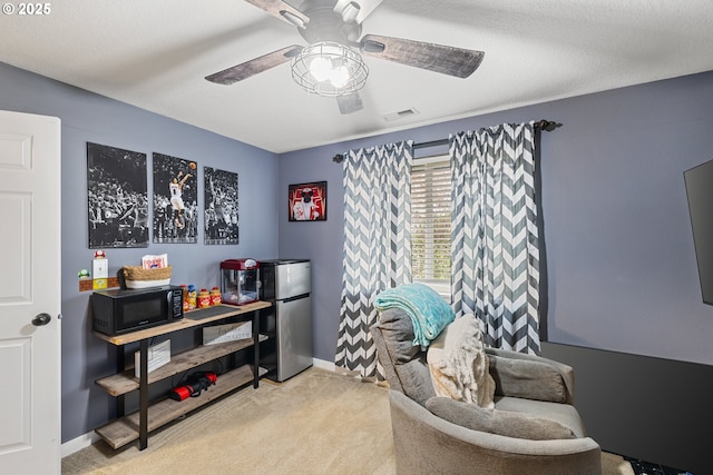816 SW Chablis Ct, Dundee, OR 97115 - living area featuring carpet flooring, ceiling fan, and baseboards