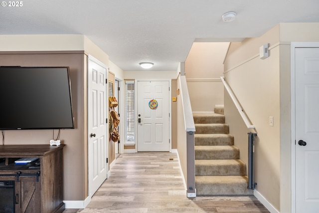 816 SW Chablis Ct, Dundee, OR 97115 - foyer with light wood-style floors, stairway, and baseboards