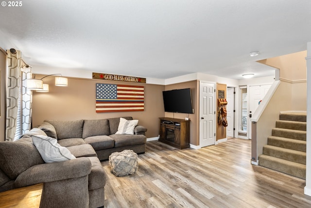 816 SW Chablis Ct, Dundee, OR 97115 - living area with wood finished floors, stairway, and baseboards