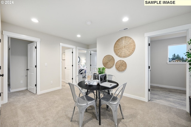 view of carpeted dining room