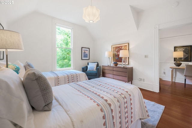 1720 NW Hoyt St, Portland, OR 97209 - bedroom featuring wood finished floors and vaulted ceiling