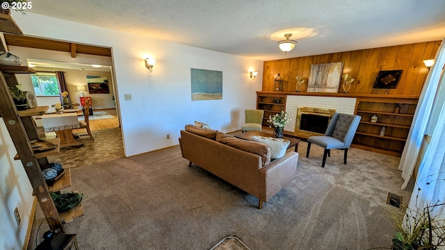 4845 Elizabeth St N, Keizer, OR 97303 - living area with carpet, a textured ceiling, and a brick fireplace