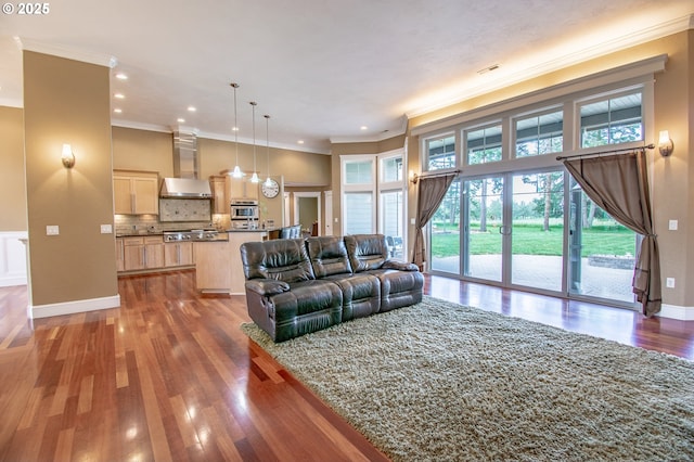 34103 Adler Ln, Creswell, OR 97426 - living area with ornamental molding, wood finished floors, recessed lighting, and baseboards
