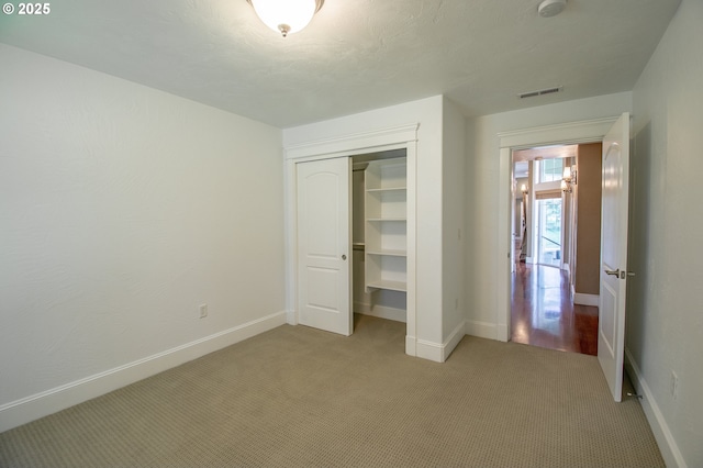 34103 Adler Ln, Creswell, OR 97426 - unfurnished bedroom with a closet, light colored carpet, and baseboards