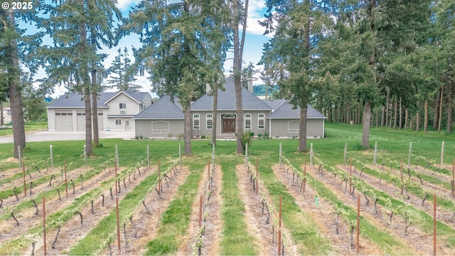 34103 Adler Ln, Creswell, OR 97426 - view of yard with dirt driveway, a view of countryside, and an attached garage