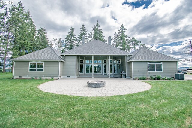 34103 Adler Ln, Creswell, OR 97426 - back of property featuring a patio, central AC, a fire pit, and a yard