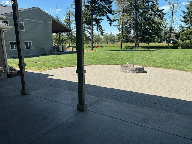 34103 Adler Ln, Creswell, OR 97426 - view of patio featuring a fire pit