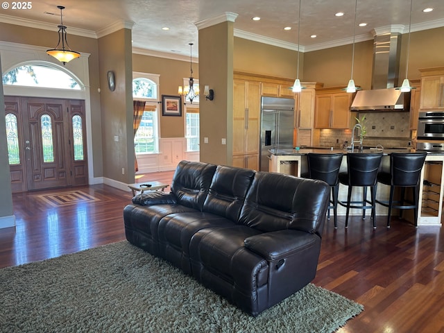 34103 Adler Ln, Creswell, OR 97426 - living area with dark wood-style flooring, a high ceiling, ornamental molding, recessed lighting, and a chandelier