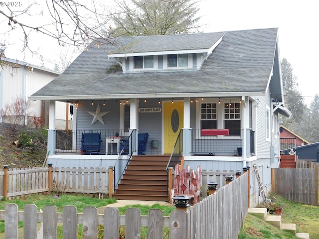 bungalow-style house featuring covered porch