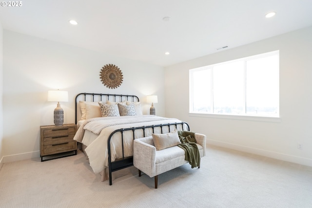 bedroom featuring visible vents, recessed lighting, baseboards, and light carpet