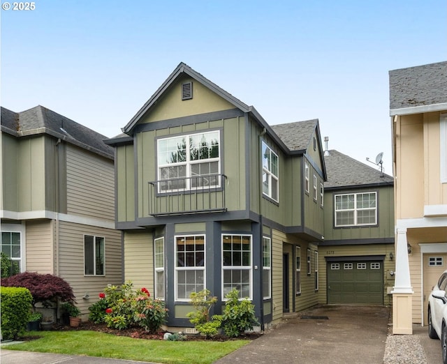 6073 SW 205th Ave, Beaverton, OR 97078 - view of front of house with board and batten siding, an attached garage, concrete driveway, and roof with shingles