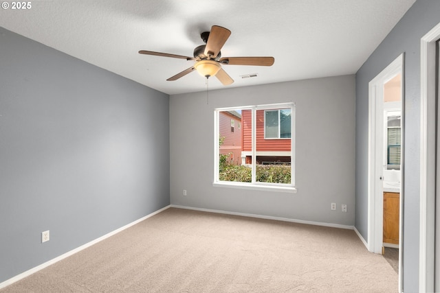 6073 SW 205th Ave, Beaverton, OR 97078 - carpeted empty room featuring baseboards and ceiling fan