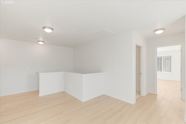 empty room with light wood-type flooring