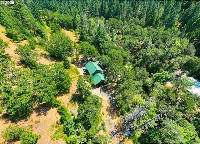 aerial view featuring a view of trees