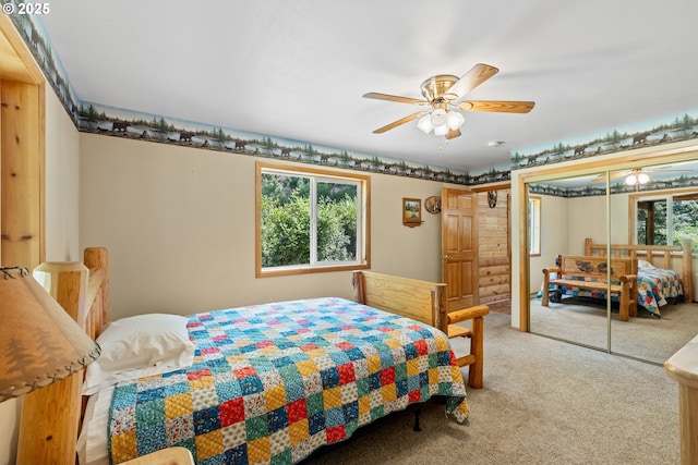 1470 E Willis Creek Rd, Winston, OR 97496 - bedroom with carpet floors, a closet, and a ceiling fan