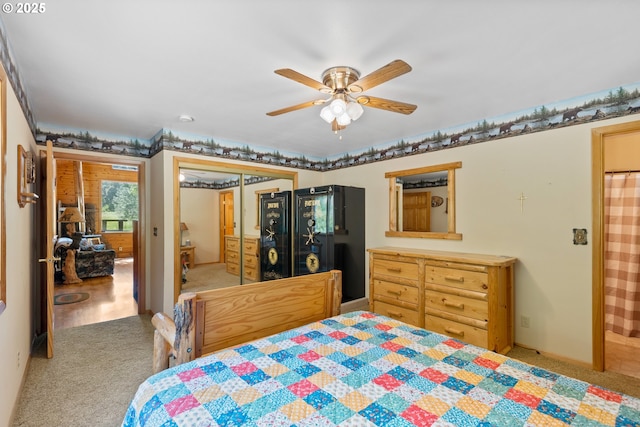 1470 E Willis Creek Rd, Winston, OR 97496 - bedroom featuring carpet flooring, ceiling fan, and a closet