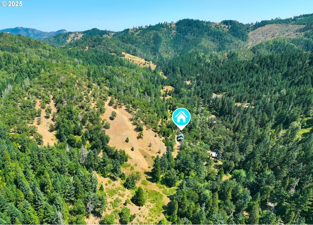1470 E Willis Creek Rd, Winston, OR 97496 - view of property location featuring a heavily wooded area and a mountainous background