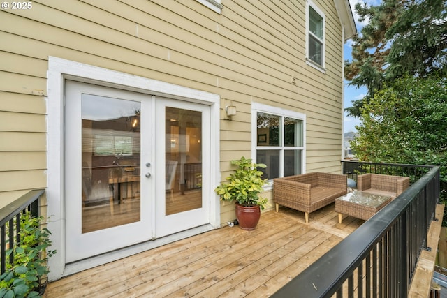 deck featuring an outdoor hangout area and french doors