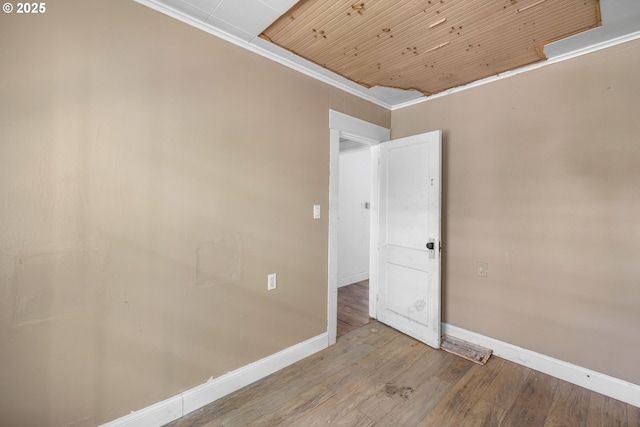 15016 NE Klickitat St, Portland, OR 97230 - unfurnished room featuring wooden ceiling, baseboards, wood finished floors, and ornamental molding