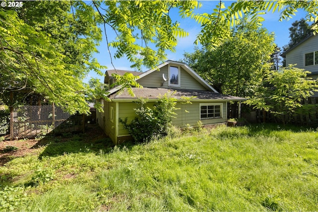 15016 NE Klickitat St, Portland, OR 97230 - view of side of home featuring a shingled roof