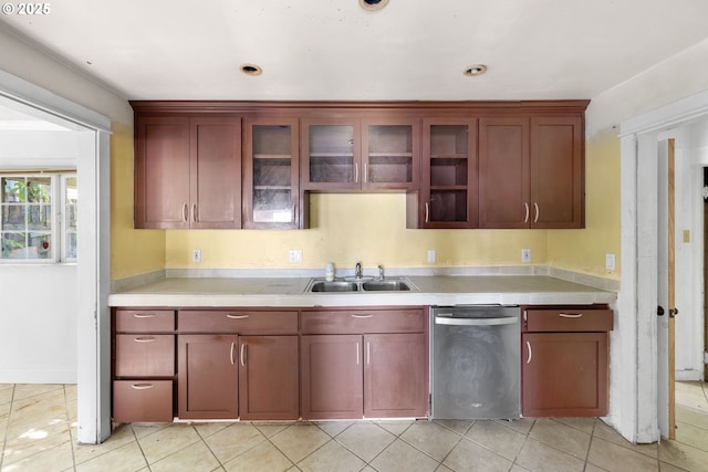 15016 NE Klickitat St, Portland, OR 97230 - kitchen featuring dishwasher, a sink, light countertops, and reddish brown cabinets