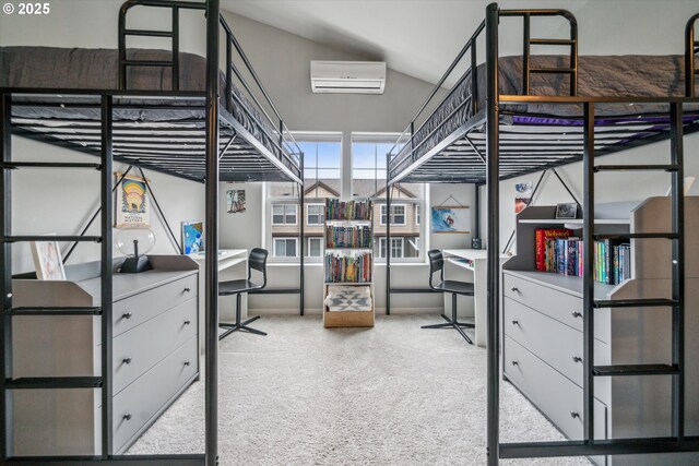 bedroom featuring vaulted ceiling, carpet flooring, and a wall mounted air conditioner