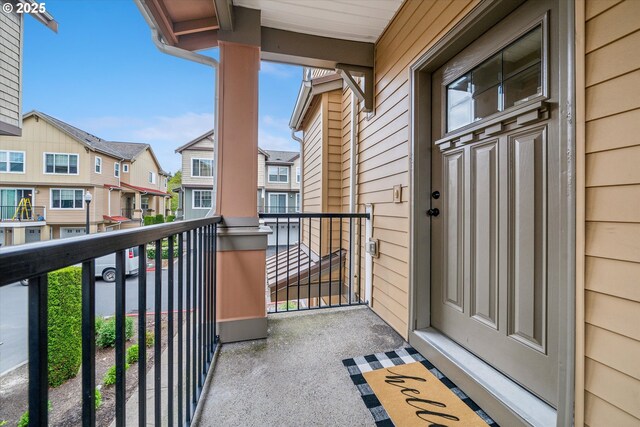 balcony featuring a residential view