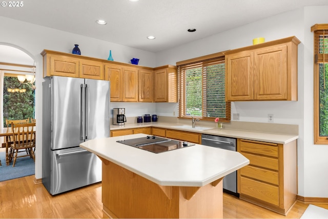 14479 Pfeifer Dr, Lake Oswego, OR 97035 - kitchen with appliances with stainless steel finishes, light wood-type flooring, light countertops, and recessed lighting