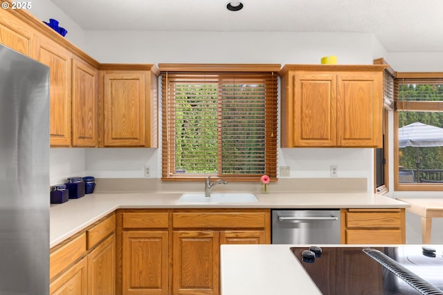 14479 Pfeifer Dr, Lake Oswego, OR 97035 - kitchen with appliances with stainless steel finishes, light countertops, and healthy amount of natural light