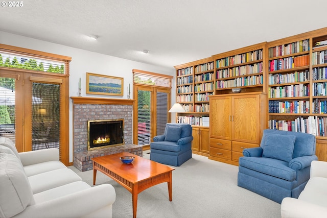 14479 Pfeifer Dr, Lake Oswego, OR 97035 - living area with light carpet, a fireplace, and a textured ceiling
