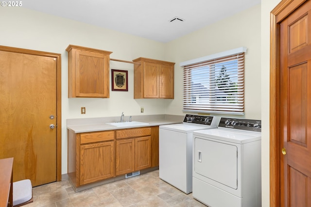 14479 Pfeifer Dr, Lake Oswego, OR 97035 - laundry area with washer and clothes dryer and cabinet space