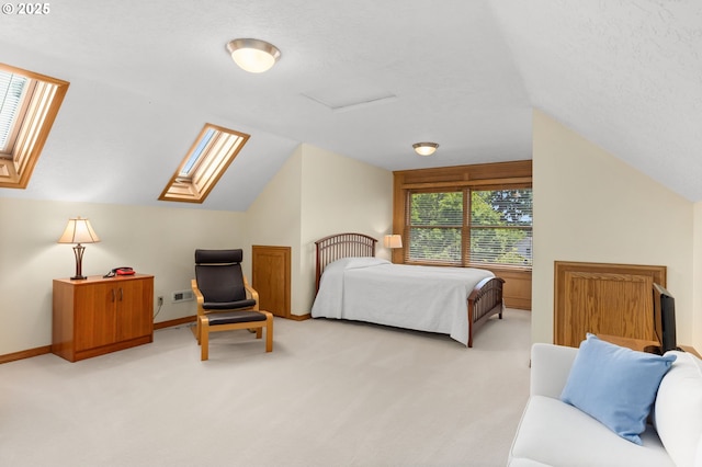 14479 Pfeifer Dr, Lake Oswego, OR 97035 - bedroom featuring vaulted ceiling, a skylight, and light carpet