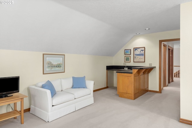 14479 Pfeifer Dr, Lake Oswego, OR 97035 - living area with vaulted ceiling, light carpet, recessed lighting, and bar