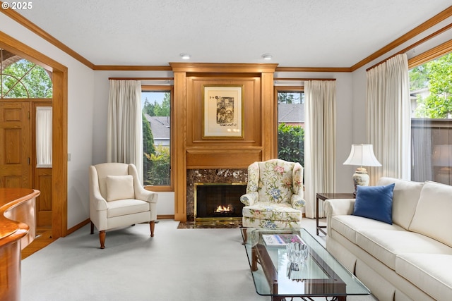 14479 Pfeifer Dr, Lake Oswego, OR 97035 - living room featuring crown molding, carpet floors, a premium fireplace, plenty of natural light, and a textured ceiling