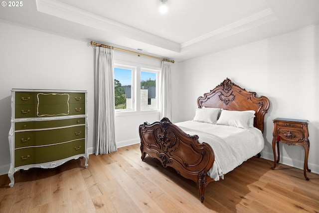 26817 SW Cade Ln, West Linn, OR 97068 - bedroom with a raised ceiling, ornamental molding, wood finished floors, and baseboards