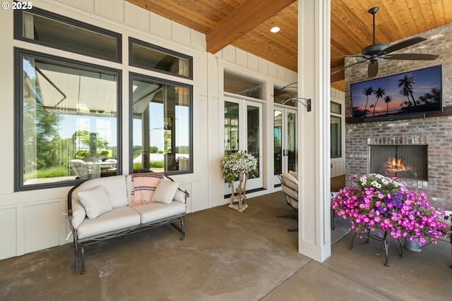 26817 SW Cade Ln, West Linn, OR 97068 - view of patio / terrace featuring an outdoor brick fireplace and ceiling fan