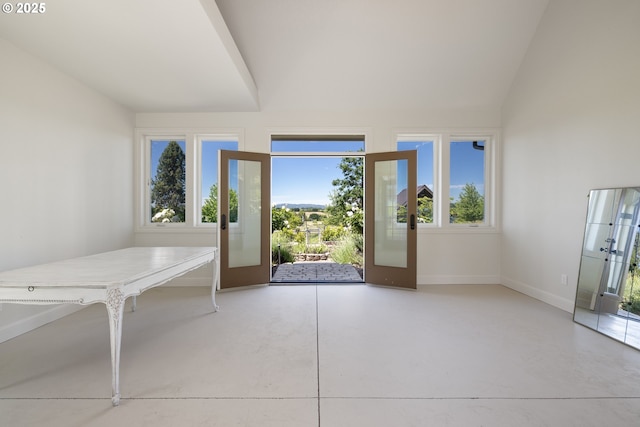 26817 SW Cade Ln, West Linn, OR 97068 - entryway featuring baseboards, finished concrete flooring, french doors, and lofted ceiling