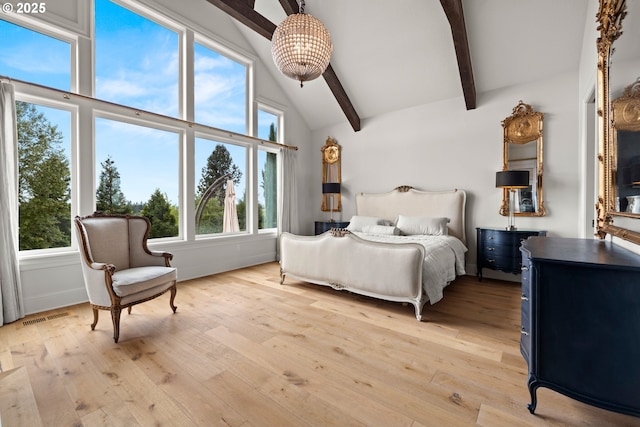 26817 SW Cade Ln, West Linn, OR 97068 - bedroom featuring beamed ceiling, light wood-style floors, multiple windows, and high vaulted ceiling