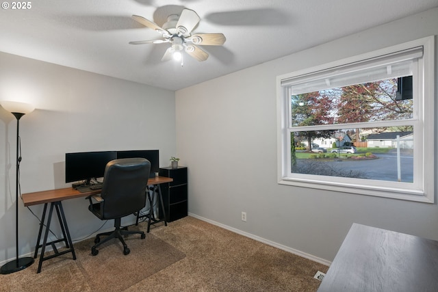 office with carpet flooring, baseboards, and ceiling fan