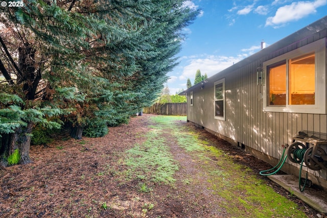 view of yard with fence