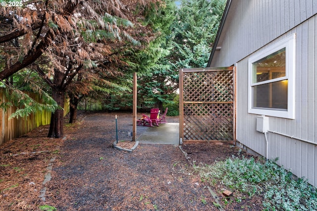 view of yard with a fenced backyard and a patio area