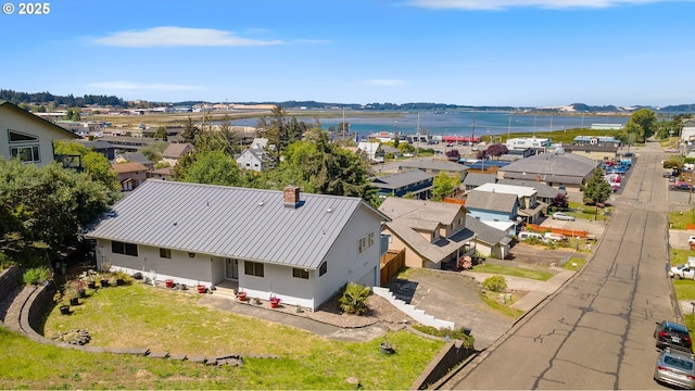 2144 Hamilton St, North Bend, OR 97459 - aerial perspective of suburban area featuring a nearby body of water