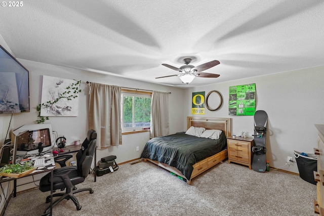 2144 Hamilton St, North Bend, OR 97459 - carpeted bedroom featuring an office area, baseboards, a textured ceiling, and ceiling fan