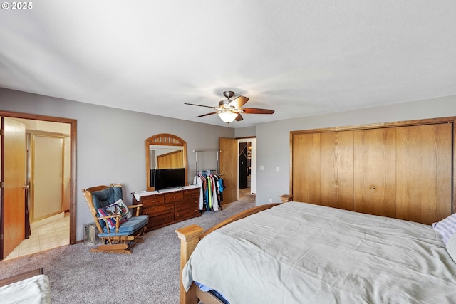 2144 Hamilton St, North Bend, OR 97459 - bedroom featuring a closet, light colored carpet, and a ceiling fan