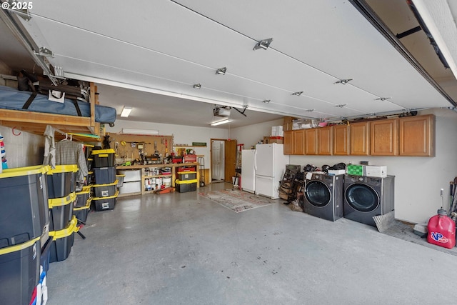 2144 Hamilton St, North Bend, OR 97459 - garage with independent washer and dryer, freestanding refrigerator, and a garage door opener